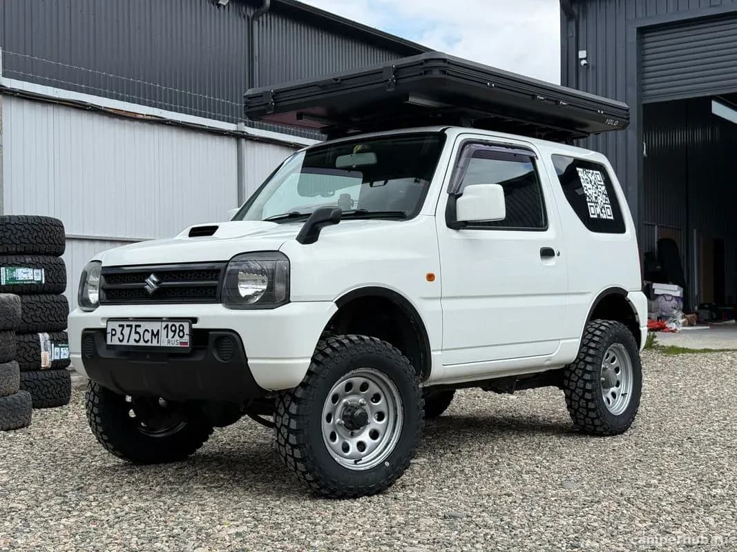 Внедорожник Suzuki Jimny с палаткой на крышу — фото 7